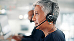 Office, call center and mature woman with headset for contact us, crm service and customer support. Business, professional consultant and person for communication, advice and online feedback at desk