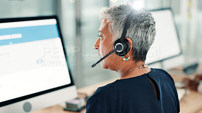 Buy stock photo Computer screen, woman and back of call center consultant in office for online consultation with crm. Contact us, help and mature female tech support agent with service for troubleshooting problem.