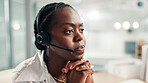 Black woman, consultant and concern with headset at call center for error or difficult customer. Female person, agent or employee with mic for virtual assistance, help or communication at office