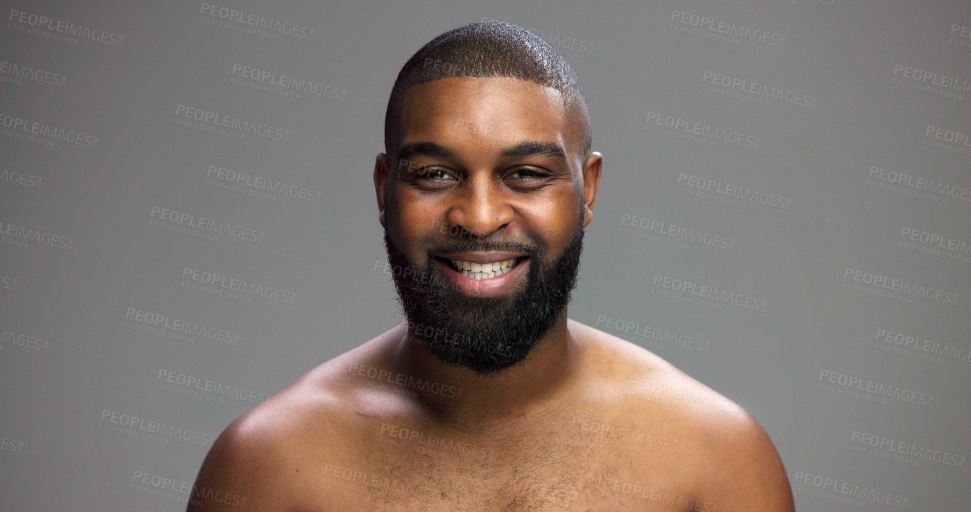 Buy stock photo Portrait, skincare and black man in studio, smile and cosmetics on gray background. African person, mockup space and happy model with treatment, grooming and shine with glow, dermatology and wellness