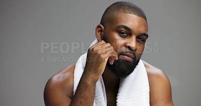 Buy stock photo Shower, beauty and portrait of black man in studio for skincare, grooming and dermatology. Cosmetics, glow and self care with person and towel on gray background for hydration, hygiene and shine