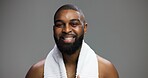 Shower, grooming and portrait of black man in studio for beauty, skincare and dermatology. Cosmetics, glow and self care with person and towel on gray background for hydration, hygiene and shine