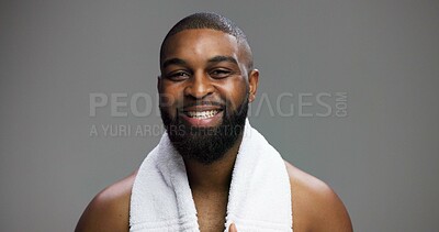 Buy stock photo Shower, grooming and portrait of black man in studio for beauty, skincare and dermatology. Cosmetics, glow and self care with person and towel on gray background for hydration, hygiene and shine