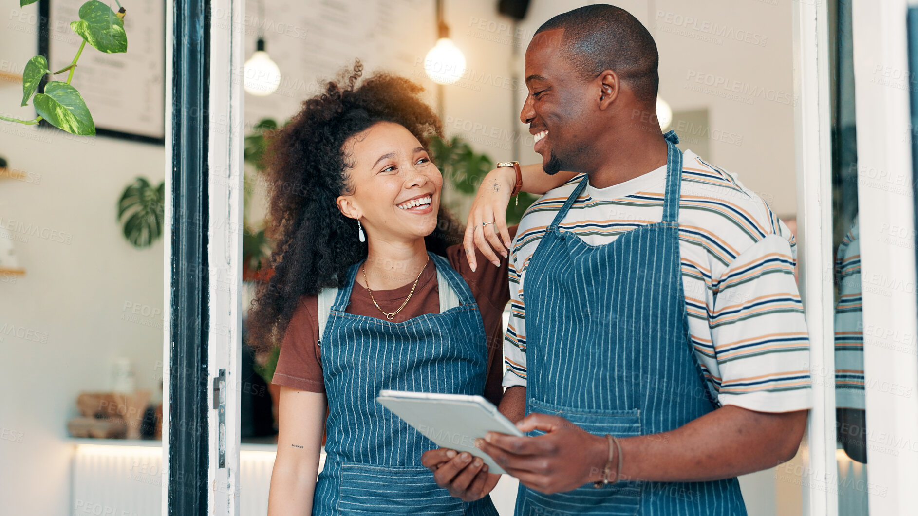 Buy stock photo Cafe, entrance and team with tablet, smile and welcome with small business people. Partnership, confidence and happy restaurant staff at door on digital app for online booking, orders or review