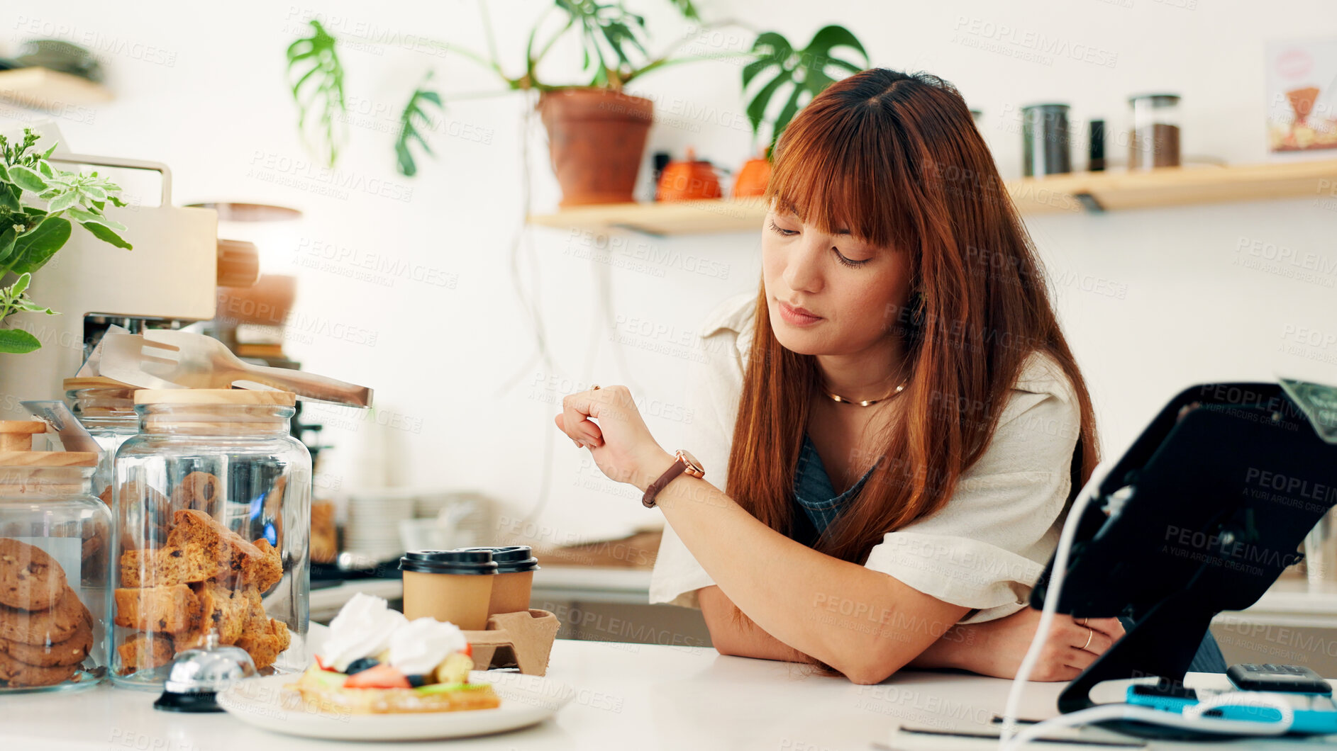 Buy stock photo Bakery, woman and check watch time for schedule, deadline or waiting for customer at counter in small business. Cafe, worker and wristwatch with clock for delay, late or impatient waitress in startup