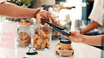 Coffee shop, card machine and customer with phone in cafe for service, help and digital pos. Restaurant, hospitality and person for online transaction, payment and purchase for takeaway drinks