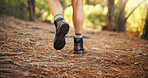 Legs, hiking and trail in forest, outdoor and fitness with steps, shoes and adventure in nature. Person, hiker and feet on ground in woods, explore and tourism with path for journey in Argentina
