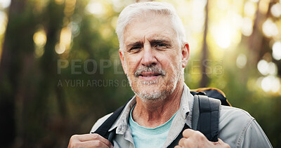 Buy stock photo Portrait, backpacking and senior man on adventure, forest and journey in nature, outdoor and retirement. Hiking, travel and elderly person on holiday in woods, trekking and exploration of environment