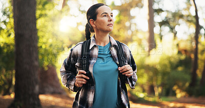 Buy stock photo Thinking, hiking and mature woman in woods for travel, holiday or vacation on adventure. Thoughts, trekking or person in forest for backpacking, vision or reflection for sightseeing to explore nature