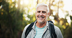 Portrait, hiker and senior man with smile, forest and journey for vacation, adventure or retirement. Travel, calm and elderly person on holiday in woods, trekking or exploration of environment in USA