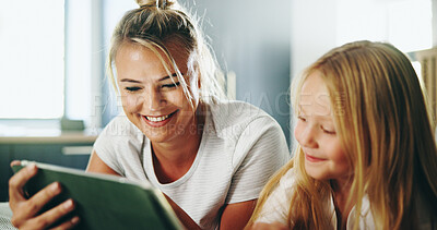 Buy stock photo Happy mother, kid and watching with tablet on bed for online entertainment, show or cartoon at home. Mom, child or daughter lying with smile on technology for subscription, app or streaming at house