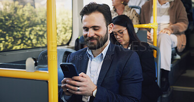Buy stock photo Happy, businessman and typing with phone on bus for travel, communication or public transport in city. Man, traveler or smile with mobile smartphone in passenger vehicle for local commute in town