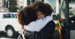Couple, hug and bus stop for travel in city for greeting, reunion and goodbye on journey for visit. People, passenger and embrace for commute with public transport, parting gesture and farewell trip