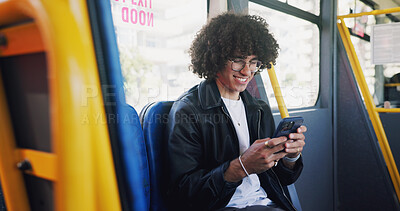 Buy stock photo Cellphone, smile and man on bus online for checking university exam results on mobile app with travel. Phone, college and male student reading acceptance email on public transportation in city.