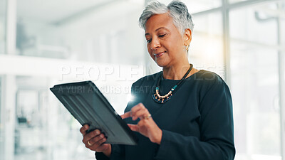 Buy stock photo Business, research and tablet with mature woman in office for information, project management, report. App, data and review with employee person in professional workplace for company development