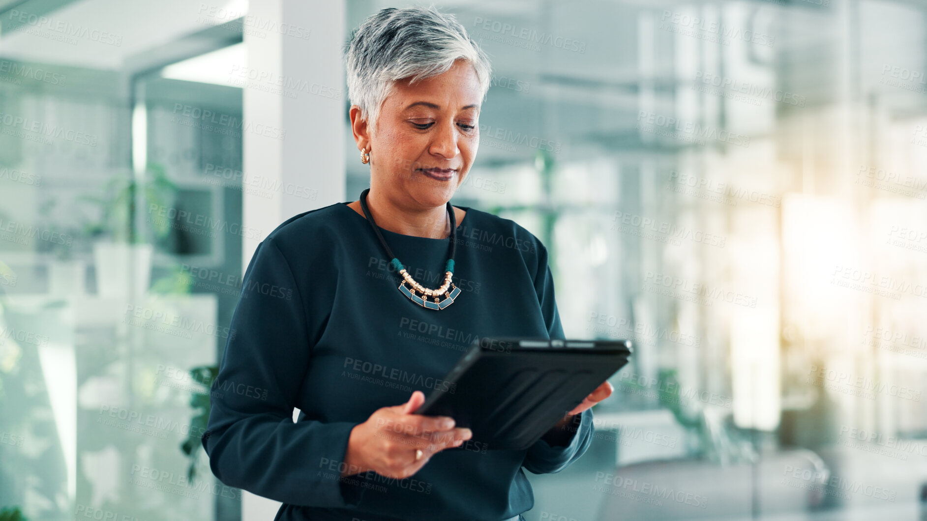 Buy stock photo App, research or tablet with business woman in office for information, project management, report. Corporate, internet or review with mature employee in professional workplace for company development