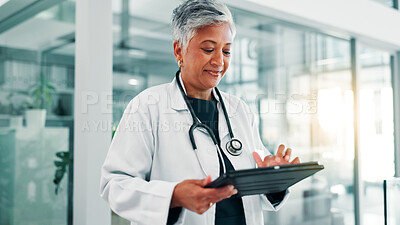 Buy stock photo Hospital, doctor and mature woman on tablet for telehealth, medical service online report. Healthcare, cardiologist and person with stethoscope on digital tech for internet, website and wellness app
