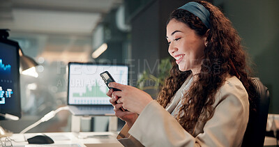 Buy stock photo Business, night and woman with cellphone, smile and professional with investments. Evening, person or employee in office, smartphone or graphs for profit growth, email or digital app for stock market
