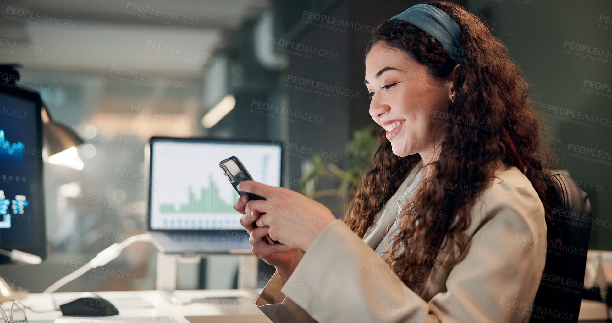 Buy stock photo Business, night and woman with cellphone, smile and professional with investments. Evening, person or employee in office, smartphone or graphs for profit growth, email or digital app for stock market