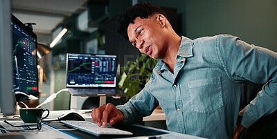 Buy stock photo Man, back pain and computer screen with trading, stress and charts for market review in office at company. Person, spine injury and burnout at night, graphs and fatigue with statistics at agency