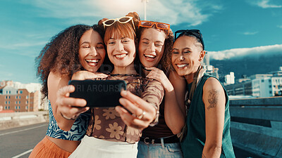 Buy stock photo Women, selfie and smile with friends on bridge, hug and bonding with streetwear for fashion in summer. Gen z girl, group and happy with photography, memory and trendy style for social media in city