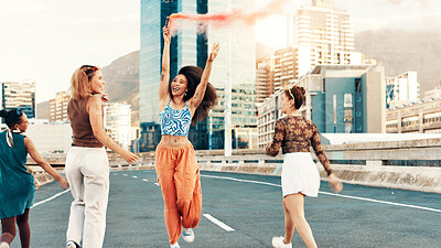 Buy stock photo Happy women, friends and city with smoke for freedom, celebration or social movement in road or street. Female people, group or community with red flare for party, festival or outdoor signal in town
