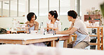 Pottery class, group and people in workshop, conversation and learning with sculpture mold. Business owner, artist and ceramic retail store with material, talking or clay manufacturing with technique