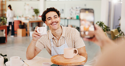 Buy stock photo Pottery class, photo and man in ceramic workshop with online post, achievement and clay product. Phone, social media and guy in studio with support, feedback and sculpture design mold or smile