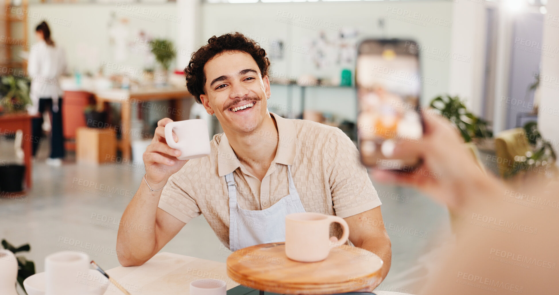 Buy stock photo Pottery class, photo and man in ceramic workshop with online post, achievement and clay product. Phone, social media and guy in studio with support, feedback and sculpture design mold or smile