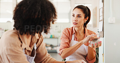 Buy stock photo Pottery class, advice and woman in ceramic workshop with help, achievement and clay product. Man, small business and mentor in studio with support, feedback and sculpture design mold with instructor