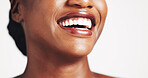 Happy, black woman and teeth with dental hygiene in studio for oral care on a white background. Closeup, female person or model with smile in joy for clean mouth, fresh breath or gum health on space