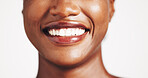 Smile, woman and closeup of mouth in studio for teeth whitening, dental hygiene and oral care. Happy, female person and implant for veneers, fresh breathe and cleaning results on white background
