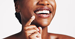 Beauty, lip scrub and smile with black woman in studio for exfoliation, spa glow and skincare. Cosmetics, sugar treatment and dermatology with closeup of person on white background for self care