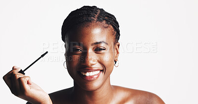 Buy stock photo Mascara, space or portrait of black woman with makeup, skincare mockup or beauty in studio on white background. Cosmetics brush, application or girl model with eyelash extensions for volume or length