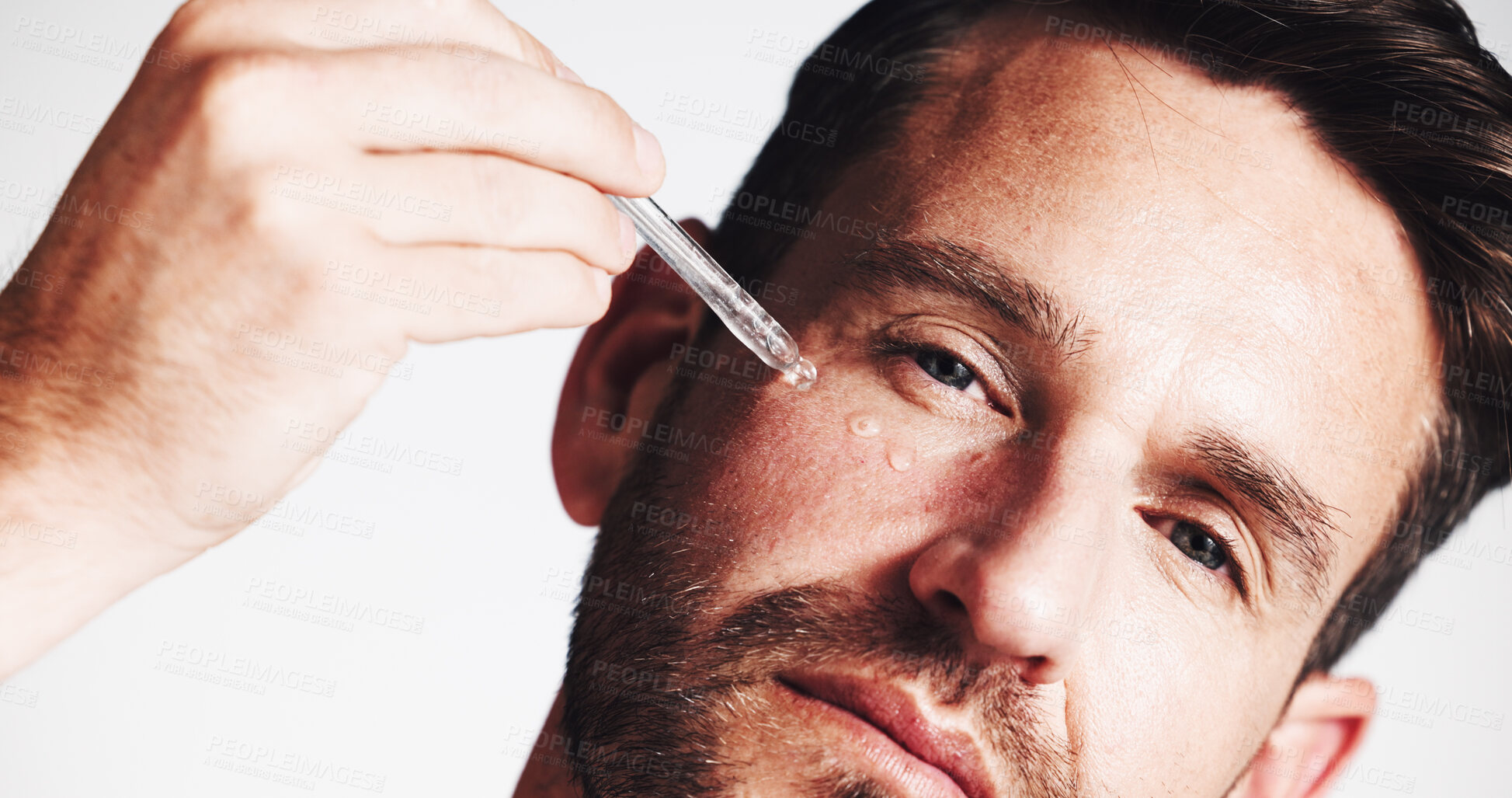 Buy stock photo Serum, beauty and portrait with man in studio for skincare, anti aging benefit and hydration. Collagen, shine and oil dropper with mature person on white background for cosmetics and self care