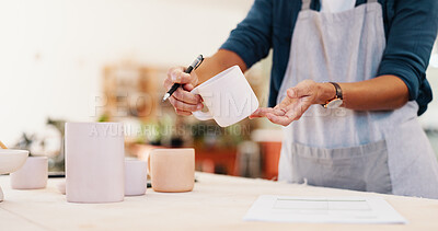 Buy stock photo Workshop, hands and inspection with cup for pottery, small business and checklist for stock management. Closeup, person and potter with document for writing, order information and mug as product