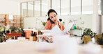Phone call, pottery and woman in workshop with paperwork for inventory, order supply or schedule. Ceramic art, person and talking on mobile with document for creative conversation or client follow up