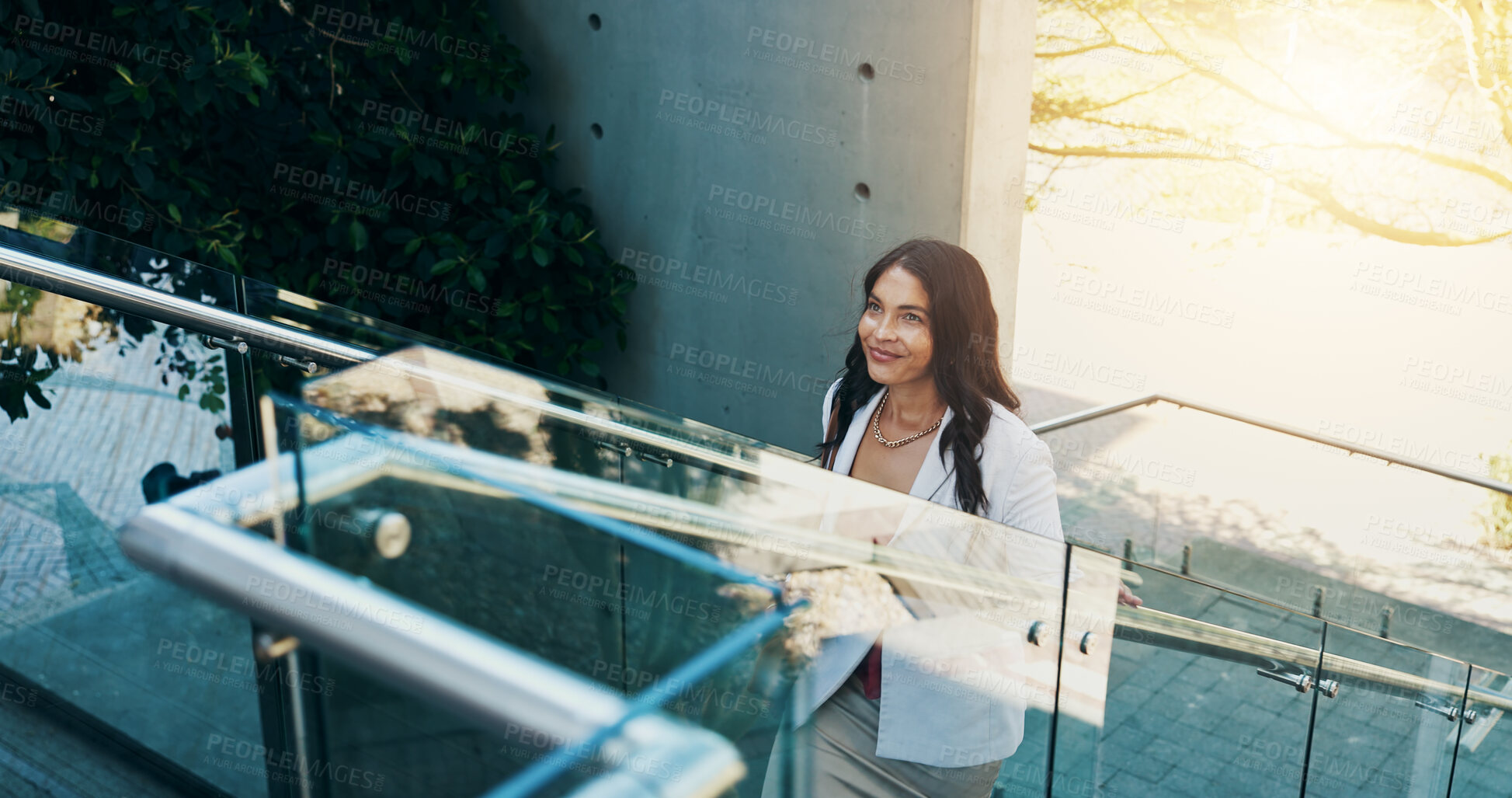 Buy stock photo Building, smile and walking with business woman outdoor to arrive at work start, career or new job in city. Above, opportunity and thinking with happy employee in urban town for commute to office
