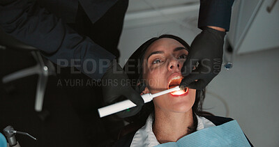 Buy stock photo Hands, medical and mouth of patient with dentist in office for checkup, operation or surgery. Appointment, healthcare or oral exam with medicine professional and woman at clinic for dental hygiene
