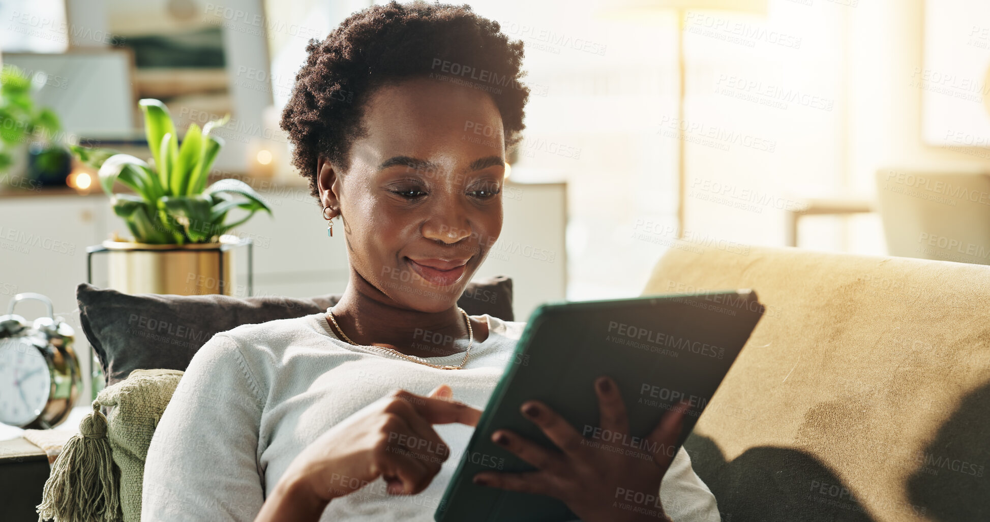 Buy stock photo Black woman, research or tablet in home with choice for online blog, interior design or social media. Check, living room or happy person on technology for house renovation tips, digital app or option
