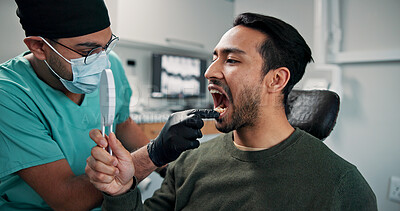 Buy stock photo Man, mirror or dentist with mask for dental care, hygiene or oral treatment at orthodontist. Male person, surgeon or open mouth with patient for tooth removal, veneers or extraction at medical clinic