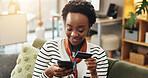 Home, credit card and black woman on sofa, smartphone and online shopping with banking app. African person, mobile user and cellphone with debit transactions, smile and payment with checkout or relax