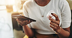 Woman, hands and medication with phone for prescription, telehealth or medical research at home. Closeup, female person or patient with pills on mobile smartphone for dosage, side effects or symptoms