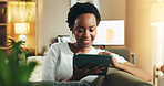 Black woman, check or tablet in home with choice for online blog, interior design or social media. Digital app, living room or happy person on technology for house renovation tips or options on couch
