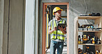 Building, tablet and walking with construction worker man on site for civil engineering or development. Checklist, inspection and planning with developer person on location for project management