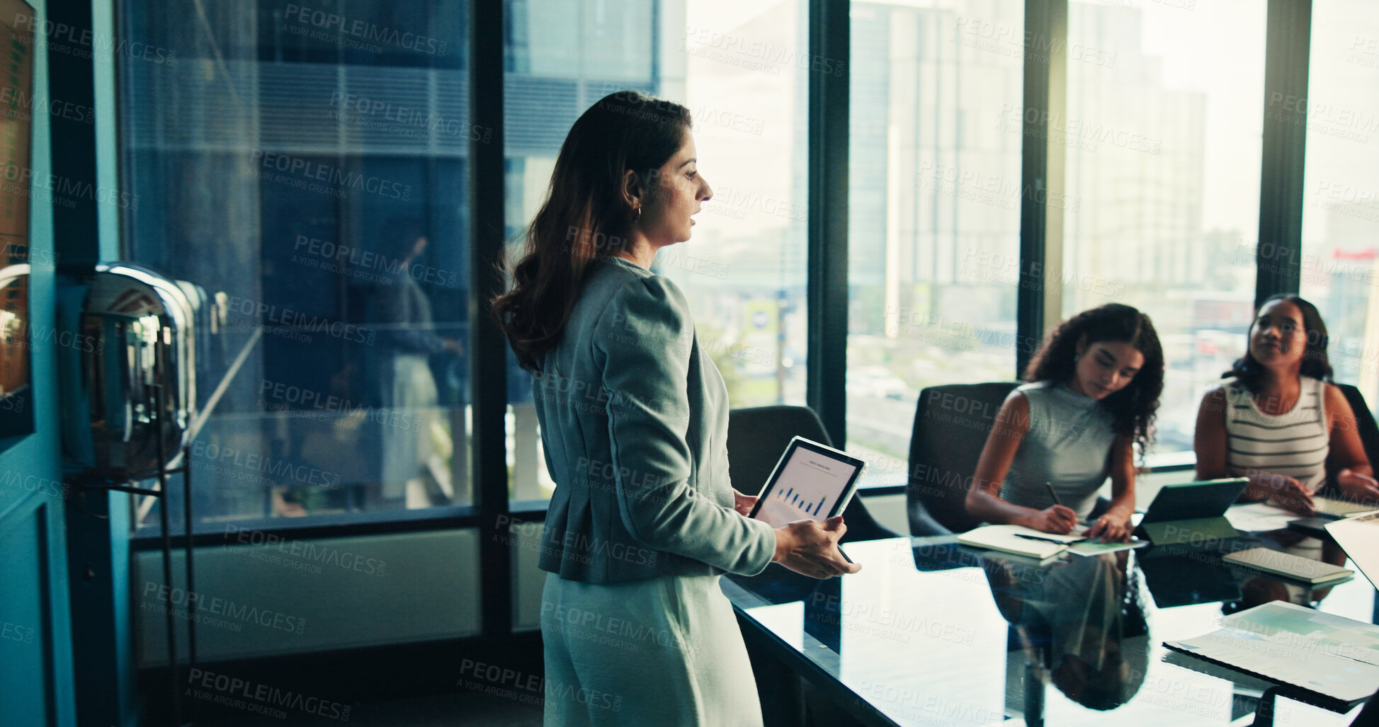 Buy stock photo Boardroom, presentation and woman with tablet, group and data analyst with info, graphs and online. Meeting, colleagues and presenter with tech for insights, screen and people with digital report
