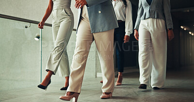Buy stock photo Feet, business people and walking in lobby, women and career ambition with teamwork. Employees, legs and closeup with group, shoes and together in hallway, workforce and cooperation with steps