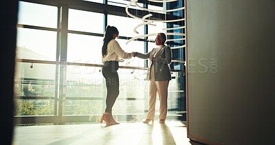 Buy stock photo Happy, business and women with handshake in office for welcome, greeting and introduction at seminar. Smile, people and shaking hands for partnership, b2b agreement and congratulations of opportunity