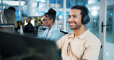 Buy stock photo Office, businessman and headphones with computer for web development, coding and listening to music. Coworking, night and male programmer with technology for programming, software update and podcast