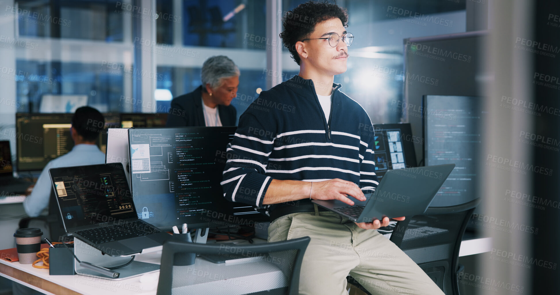 Buy stock photo Coding, man and thinking with laptop in office for debugging solution, software update or app development deadline. Night, coder or technology for website troubleshooting, problem solving or overtime